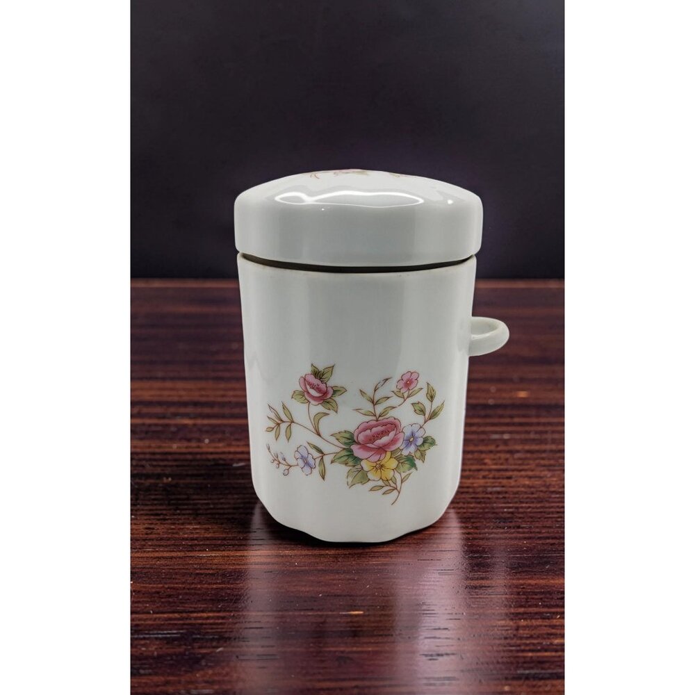 vintage 1988 ftda porcelain "bouquet of hearts" tea container.